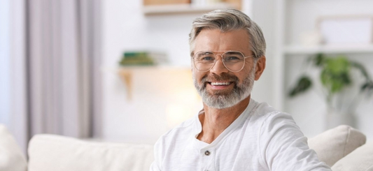 Man relaxed at home representing confident on-demand use of Herbal Mojo for Guys